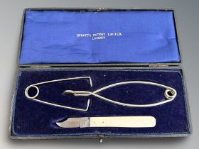 A vintage Spratt's caponizing set