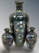 A Japanese cloisonne enamel baluster vase, height 31 cm, and a smaller pair.