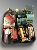 A group of tin plate wind up models including locomotives, etc.