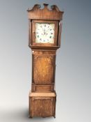 A 19th century oak and mahogany long case clock with pendulum and weights,
