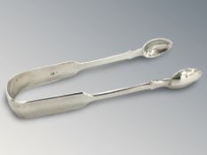 A pair of Victorian silver sugar tongs, maker CB, London 1847.