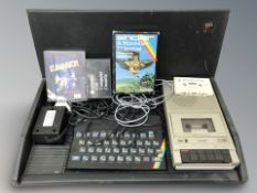 A Sinclair ZX Spectrum, in case, a Ferguson cassette player, cassettes.