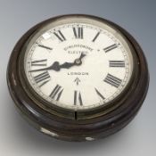 A Synchronome circular electric wall timepiece, diameter 26 cm.