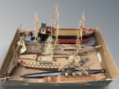 A group of scale model boats.