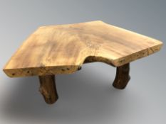 A large tree cross section coffee table, 125 cm W x 96 cm x 53 cm.