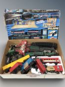 A battery operated train set in box, further modern model locomotives and passenger cars.