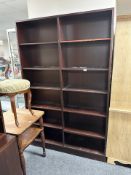 A Scandinavian stained open bookcase, 120 cm x 30 cm x 187 cm.