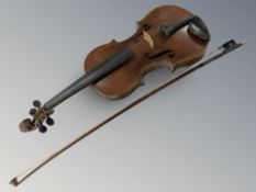 An early 20th century violin with one piece 14