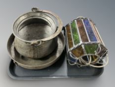 A leaded stained glass hanging lantern, a swing handled cooking pot and a further dish.