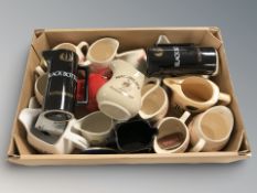 A collection of ceramic jugs bearing whisky advertising including Black Bottle, Famous Grouse,