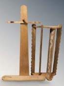 A continental oak plate rack, width 103 cm, and a further similar oak stand.