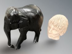 A carved hardwood elephant figure,