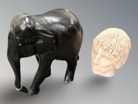 A carved hardwood elephant figure,