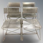 Six folding chrome metal chairs