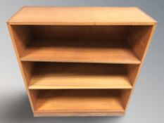 A teak open bookshelf,