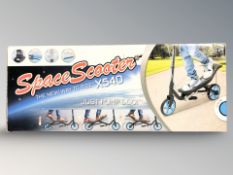 A Space scooter, in box.