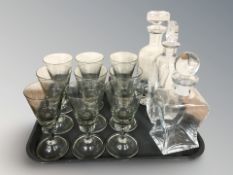 A set of ten continental drinking glasses, three decanters including a Swedish Orrefors example.