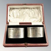 A boxed pair of George V silver napkin rings, George Howson, Sheffield 1933.