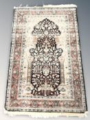 A Kashmir silk rug,