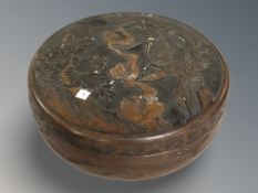 A Chinese carved round lidded box,