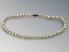 A pearl necklace with 9ct white gold clasp,