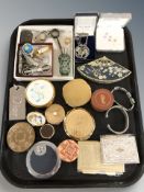 A group of compacts and pill boxes, costume jewellery, novelty key rings,