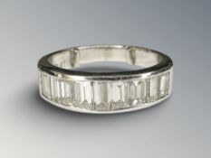 A good quality nine stone baguette diamond ring in platinum approximately 1.