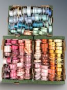 A large quantity of haberdasher's ribbons in various lengths, designs and colours.