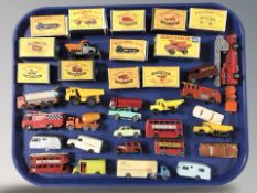 A quantity of reproduction Matchbox series die cast scale model vehicles,