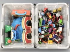 A quantity of Thomas the Tank Engine toys.