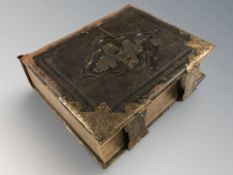 A Victorian leather bound Holy Bible with colour plates and maps.