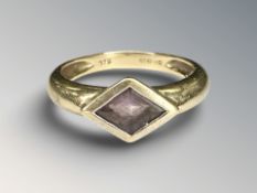 A 9ct yellow gold dress ring set with an amethyst, size M/N CONDITION REPORT: 2.9g.