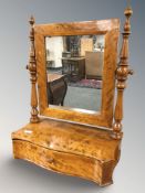 A satinwood serpentine front dressing table mirror,