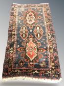 A Kurdish rug, North-West Iran, 192 cm x 113 cm.