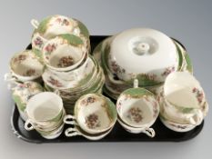 Forty seven pieces of Paragon green and gilt floral tea china.