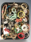 A large quantity of costume bead necklaces, bangles, simulated pearls, etc.