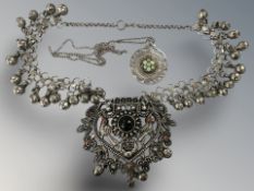 A silver millefiori glass disc pedant on chain,