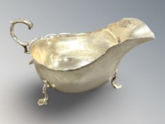 An Edwardian silver sauce boat, Reid & Sons, London 1908, length 18cm.
