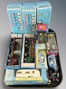 A group of reproduction Tri-Ang Spot-On die cast vehicles, a further unboxed example,
