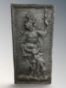 A cast iron panel depicting a female warrior, 59 cm x 28 cm.
