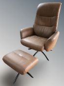 A modern Scandinavian brown leather swivel lounge armchair and matching footstool.