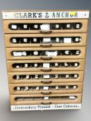A vintage glazed plywood Clark's Anchor seven drawer haberdashery counter top chest,
