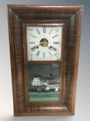 An early 20th century continental wall clock, height 66 cm.