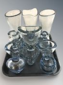 A group of Holmegaard blue tinted glass vases and bowls.