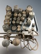 A collection of cast iron scales and weights