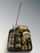 A brass figure of an elephant, mortars and pestles, fire poker in the form of a golf putter,