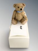 A modern Steiff mohair teddy bear, with tag, in box.