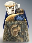 A group of Scandinavian studio pottery items including plaque depicting squirrel, bowls,