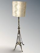 A brass standard lamp,