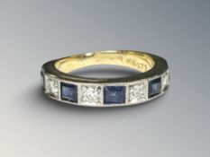 An 18ct yellow gold sapphire and diamond half eternity ring,
